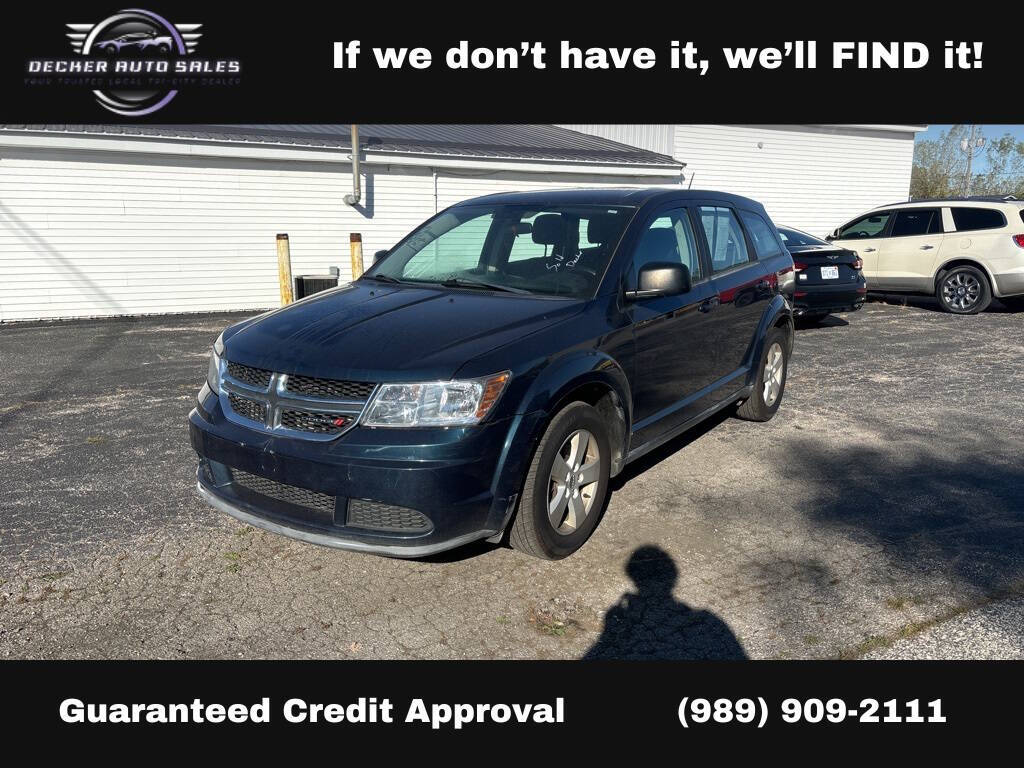 2014 Dodge Journey for sale at DECKER AUTO SALES in Bay City, MI