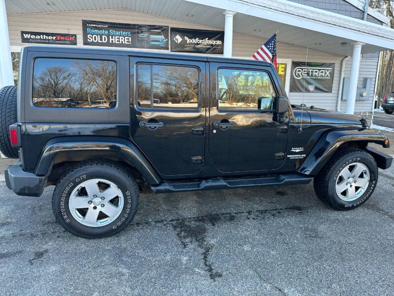 2011 Jeep Wrangler Unlimited for sale at Stans Auto Sales in Wayland MI