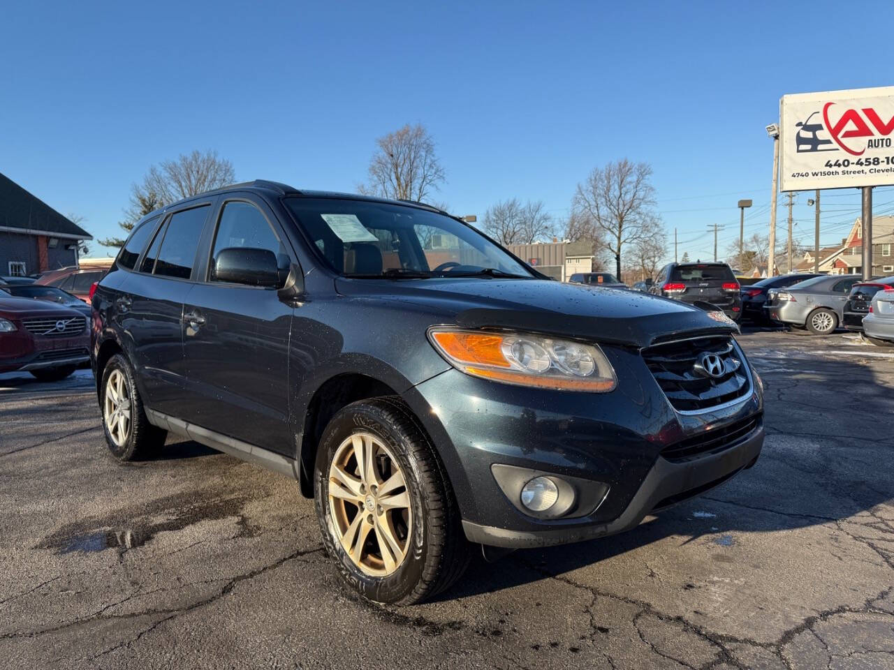 2010 Hyundai SANTA FE for sale at AVS AUTO GROUP LLC in CLEVELAND, OH