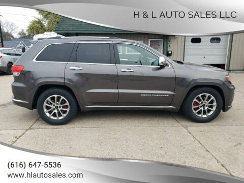 2014 Jeep Grand Cherokee for sale at H & L AUTO SALES LLC in Wyoming MI