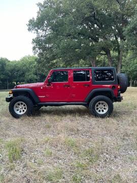 2011 Jeep Wrangler Unlimited for sale at BARROW MOTORS in Caddo Mills TX