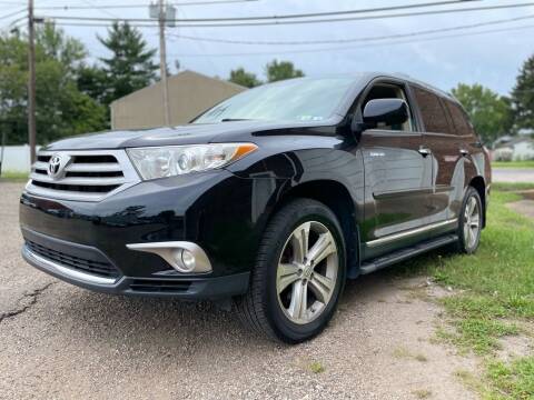 2013 Toyota Highlander for sale at Jim's Hometown Auto Sales LLC in Byesville OH