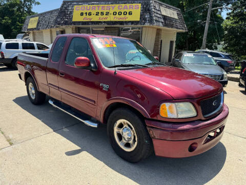 2003 Ford F-150 for sale at Courtesy Cars in Independence MO