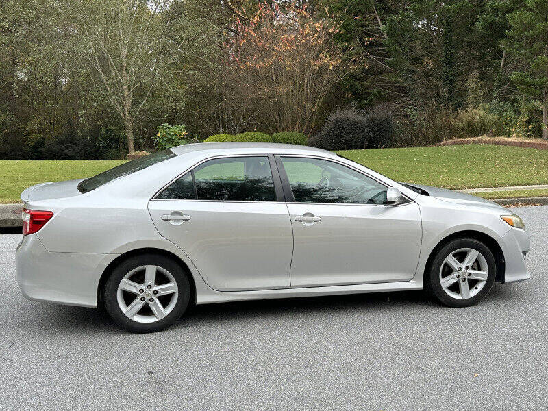 2012 Toyota Camry for sale at SHURE AUTO SALES in Snellville, GA