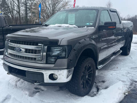 2013 Ford F-150 for sale at DISTINCT AUTO GROUP LLC in Kent OH