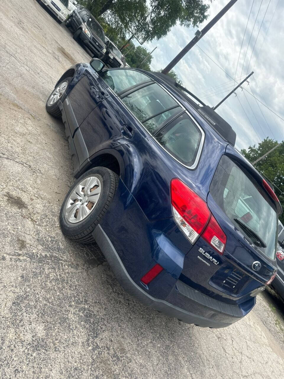 2011 Subaru Outback for sale at Calderon Auto Sales in Des Moines, IA