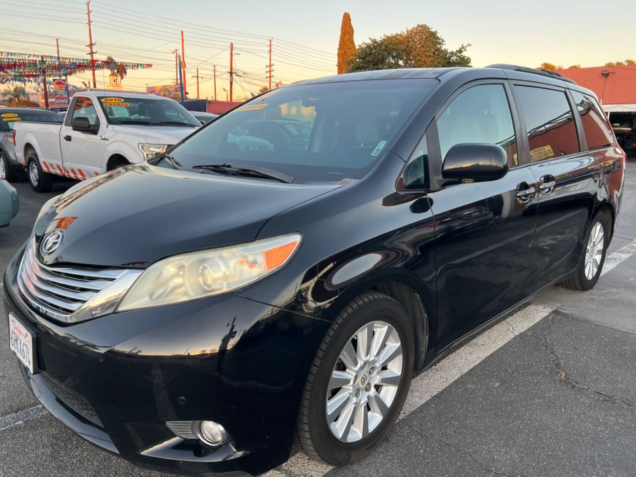 2011 Toyota Sienna for sale at Unique Auto Sales, Inc. in Bell, CA