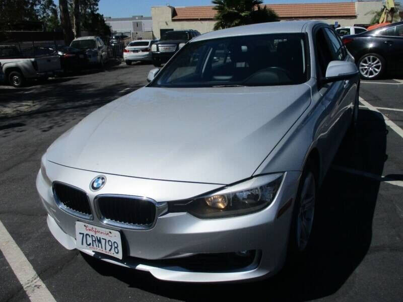 2014 BMW 3 Series for sale at Unique Auto Sales, Inc. in Bell, CA