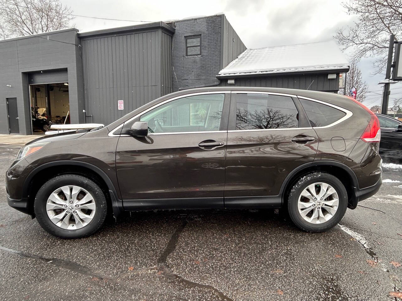 2014 Honda CR-V for sale at Auto Shop in Wyoming, MI