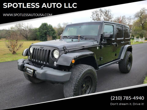2014 Jeep Wrangler Unlimited for sale at SPOTLESS AUTO LLC in San Antonio TX