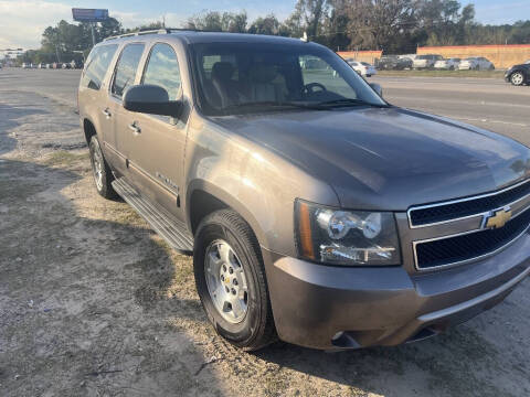 2014 Chevrolet Suburban for sale at SCOTT HARRISON MOTOR CO in Houston TX