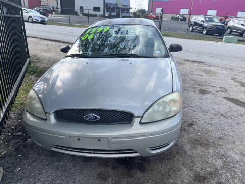 2006 Ford Taurus for sale at SCOTT HARRISON MOTOR CO in Houston TX