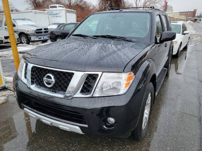 2011 Nissan Pathfinder for sale at Howe's Auto Sales in Lowell MA