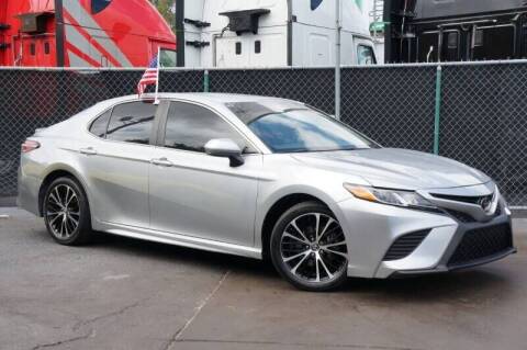 2018 Toyota Camry for sale at LATINOS MOTOR OF ORLANDO in Orlando FL