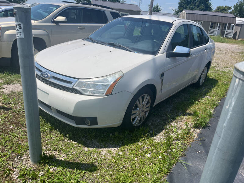 2009 Ford Focus for sale at HEDGES USED CARS in Carleton MI