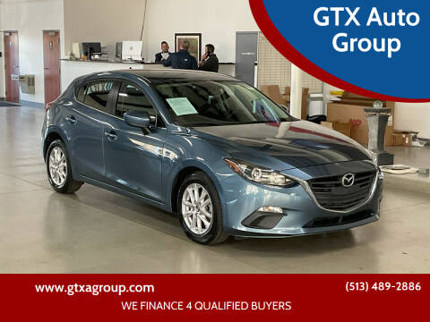 2014 Mazda MAZDA3 for sale at GTX Auto Group in West Chester OH
