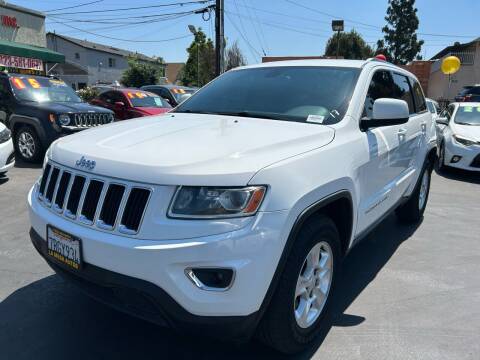 2014 Jeep Grand Cherokee for sale at La Mesa Auto Sales in Huntington Park CA