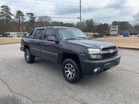 2003 Chevrolet Avalanche for sale at First Auto Sales in Winder GA