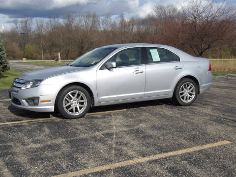 2012 Ford Fusion for sale at Crossroads Used Cars Inc. in Tremont IL