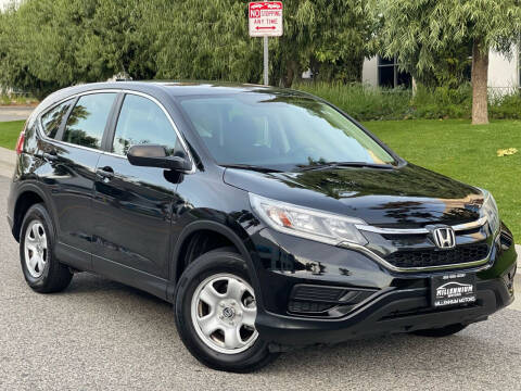 2015 Honda CR-V for sale at MILLENNIUM MOTORS in Van Nuys CA