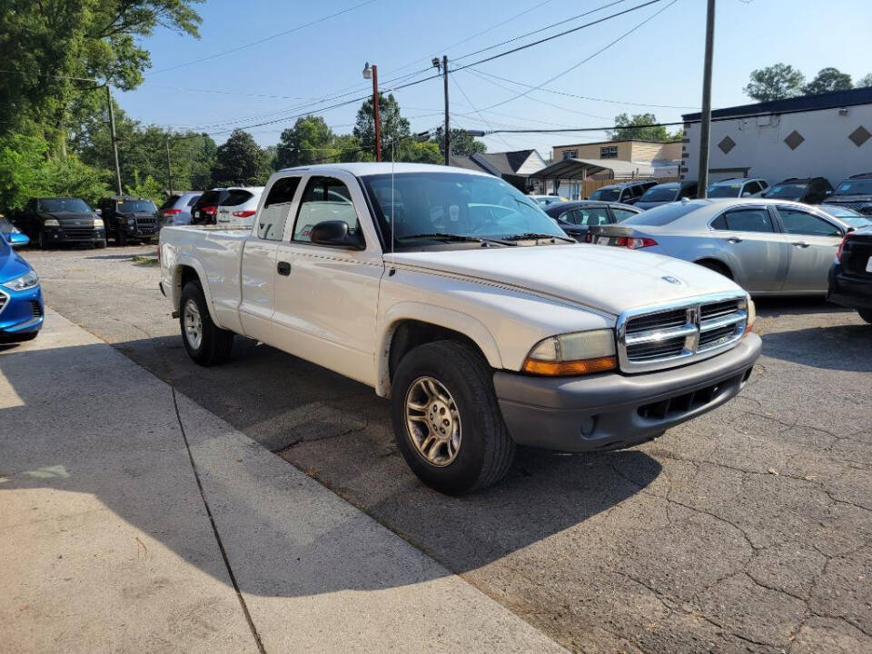 2004 Dodge Dakota for sale at DAGO'S AUTO SALES LLC in Dalton, GA