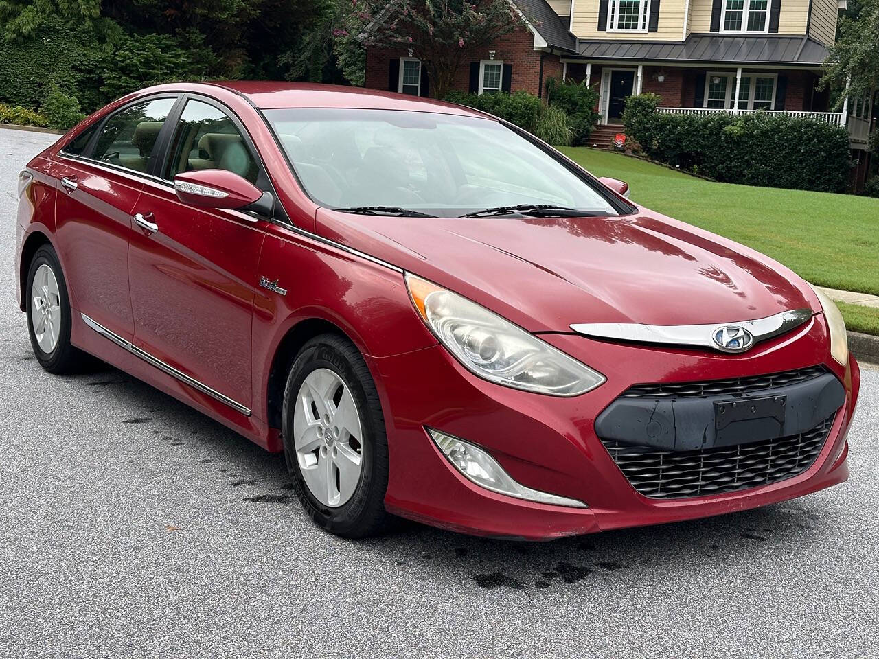 2012 Hyundai SONATA Hybrid for sale at SHURE AUTO SALES in Snellville, GA