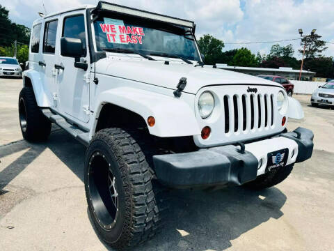 2012 Jeep Wrangler Unlimited for sale at CE Auto Sales in Baytown TX