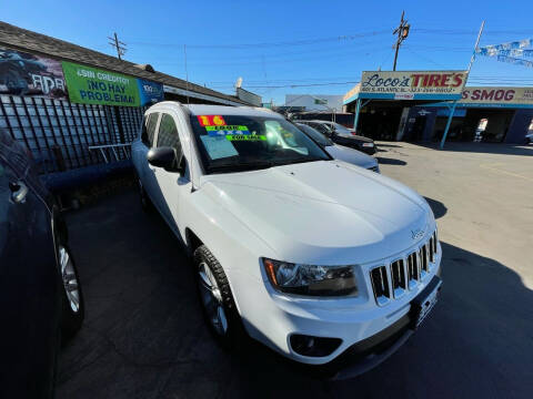 2016 Jeep Compass for sale at ROMO'S AUTO SALES in Los Angeles CA