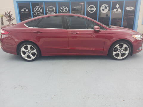 2014 Ford Fusion for sale at BestCar in Kissimmee FL