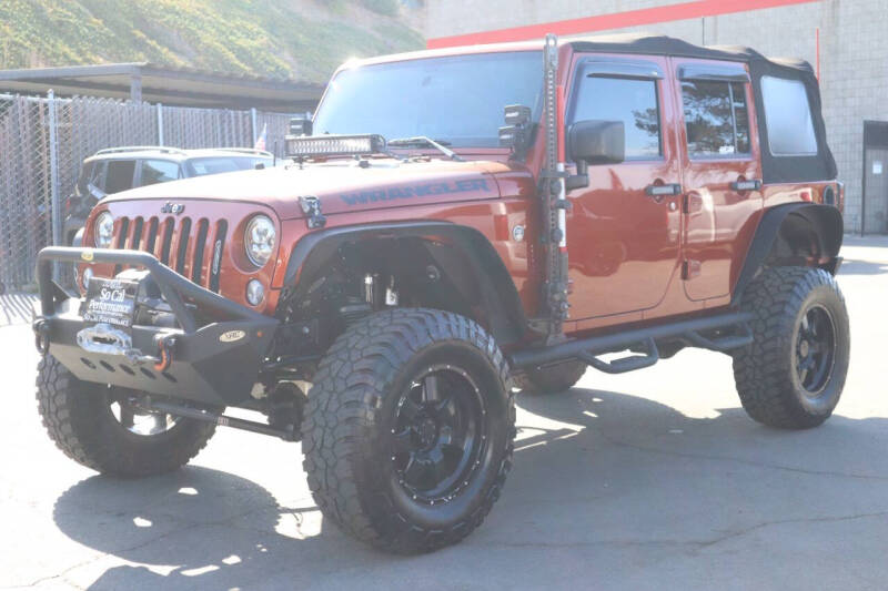 Used 2014 Jeep Wrangler Unlimited Sport with VIN 1C4BJWDG4EL202457 for sale in San Diego, CA