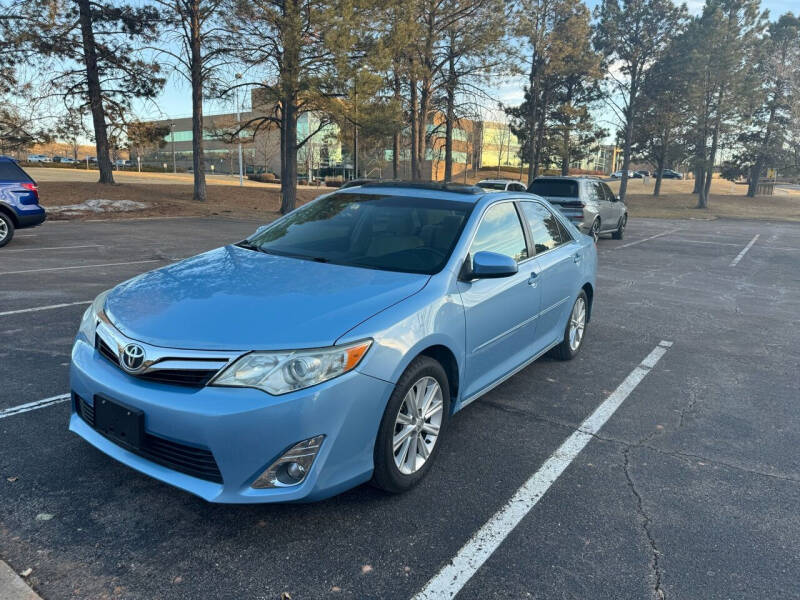 2013 Toyota Camry for sale at QUEST MOTORS in Centennial CO