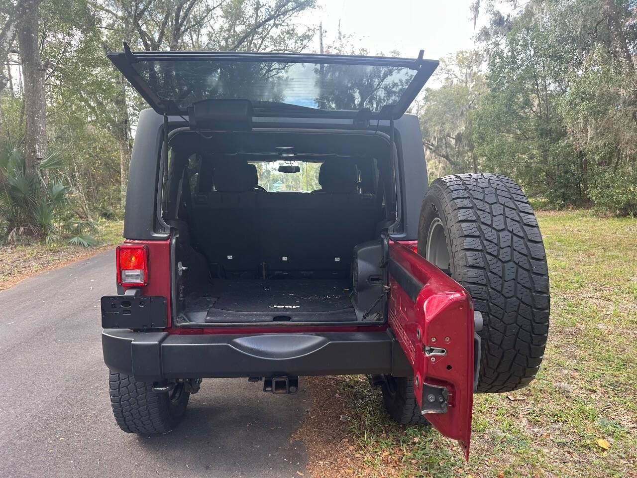 2013 Jeep Wrangler Unlimited for sale at SOUTHERN AUTO WHOLESALERS in Deland, FL