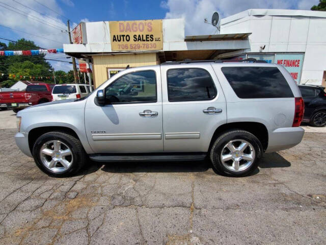 2011 Chevrolet Tahoe for sale at DAGO'S AUTO SALES LLC in Dalton, GA