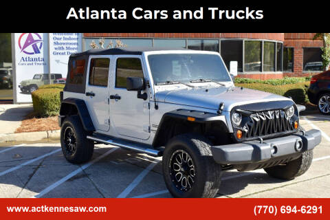 2011 Jeep Wrangler Unlimited for sale at Atlanta Cars and Trucks in Kennesaw GA