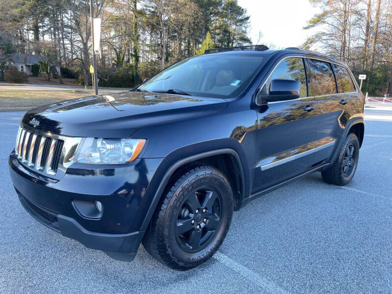 2011 Jeep Grand Cherokee for sale at PFA Autos in Union City GA