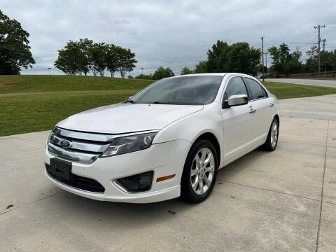 2012 Ford Fusion for sale at Triple A's Motors in Greensboro NC