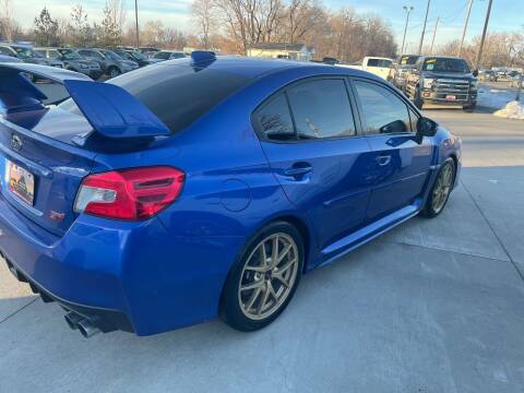 2015 Subaru WRX for sale at Azteca Auto Sales LLC in Des Moines IA