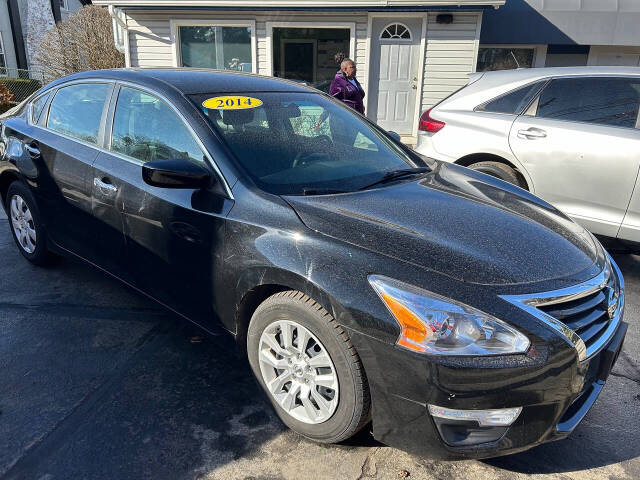 2014 Nissan Altima for sale at Chuckie Bizzarro's Fleetwing Auto in Erie, PA