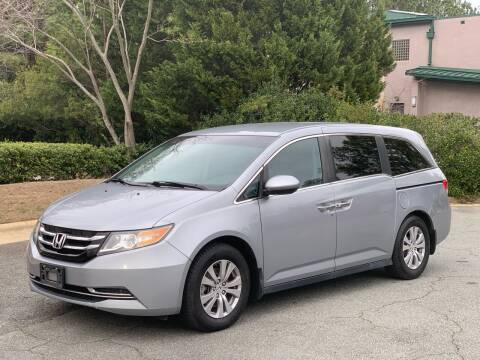 2016 Honda Odyssey for sale at Triangle Motors Inc in Raleigh NC