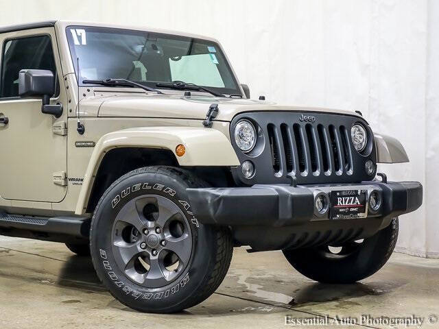 Used 2017 Jeep Wrangler Unlimited Freedom Edition with VIN 1C4BJWDGXHL599211 for sale in Tinley Park, IL