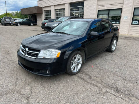 2011 Dodge Avenger for sale at Dean's Auto Sales in Flint MI