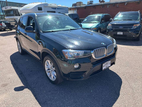 2017 BMW X3 for sale at BERKENKOTTER MOTORS in Brighton CO