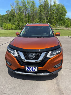 2017 Nissan Rogue for sale at Regan's Automotive Inc in Ogdensburg NY