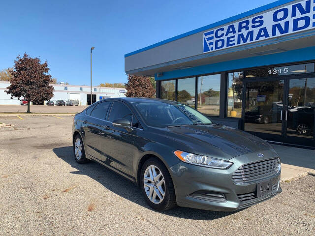 2016 Ford Fusion for sale at Cars On Demand LLC in Lansing, MI