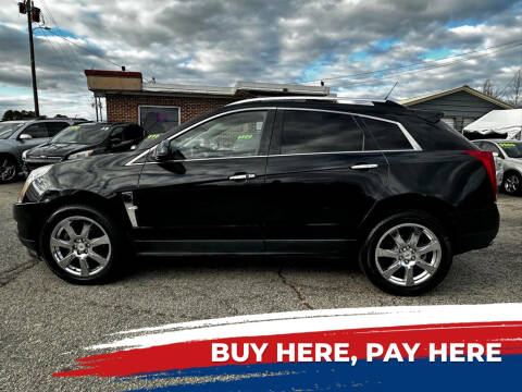 2010 Cadillac SRX for sale at Autocom, LLC in Clayton NC