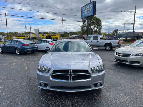 2014 Dodge Charger for sale at TIGER AUTO SALES INC in Redford MI