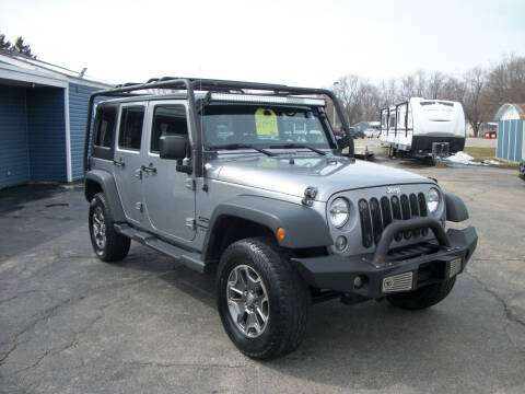 2015 Jeep Wrangler Unlimited for sale at USED CAR FACTORY in Janesville WI