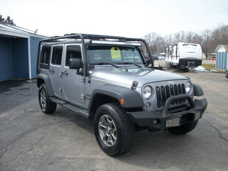 2015 Jeep Wrangler Unlimited for sale at USED CAR FACTORY in Janesville WI