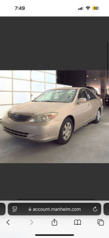 2002 Toyota Camry for sale at ARISE MOTORS in Pompano Beach FL