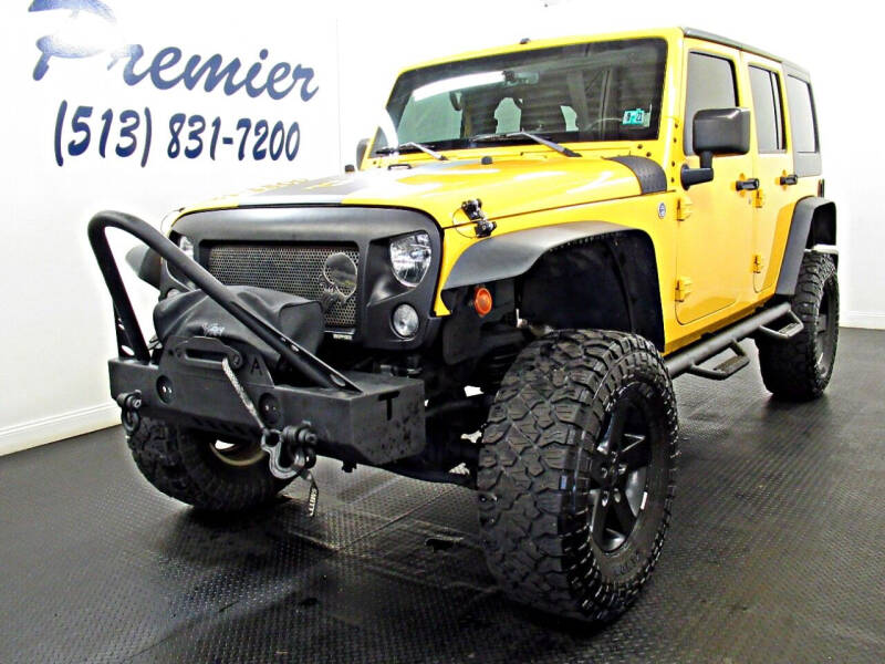2015 Jeep Wrangler Unlimited for sale at Premier Automotive Group in Milford OH